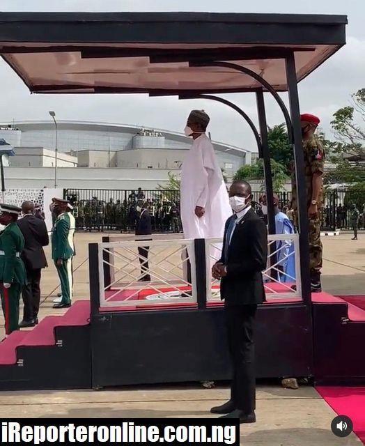 Tongues Wagging As Buhari Stands On A Stage Supported By Stones In Lagos (Video)