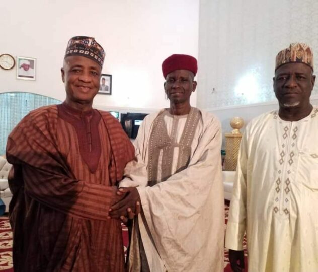 Sen. Wamakko , Sokoto APC leader, left receives Alhaji Jelani Danbuga