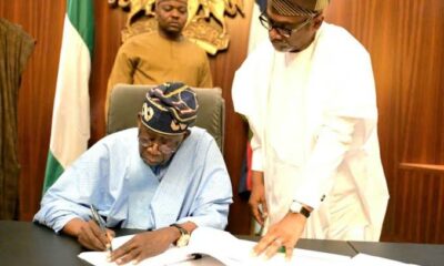 Bola Tinubu signs