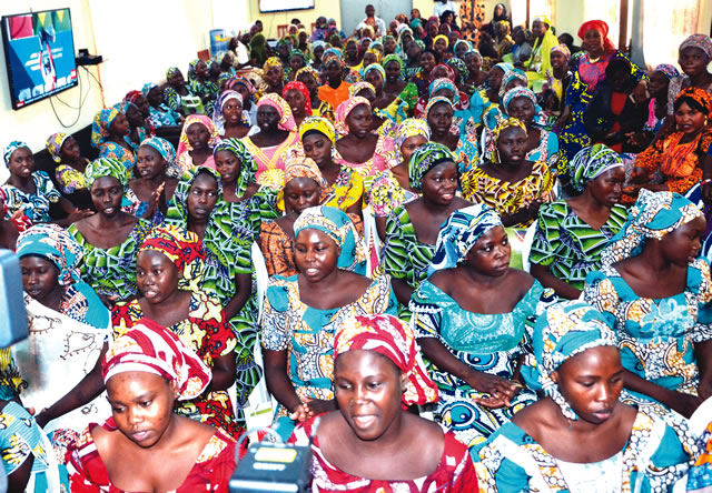 The recently released Chibok schoolgirls when they were handed over by the Department of State Services to the Ministry of Women Affairs in Abuja. on Tuesday