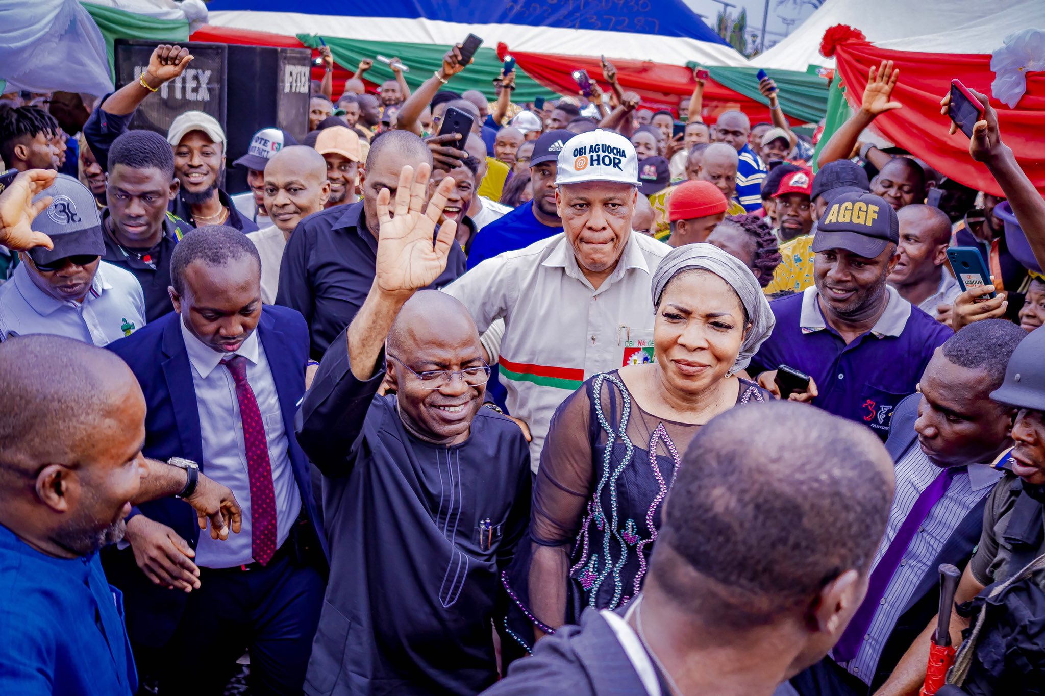 Otti greeting crowd