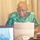 president bola tinubu during a video call conference with super eagles