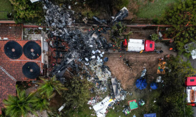 This photo shows an aerial view of the wreckage of an airplane that crashed with 61 people on board