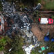 This photo shows an aerial view of the wreckage of an airplane that crashed with 61 people on board