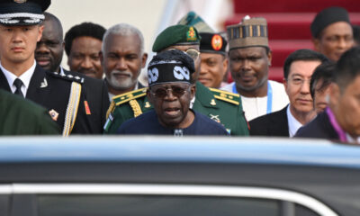 Nigerias President Bola Ahmed Tinubu C arrives at Beijing Capital Airport ahead of the Forum on C