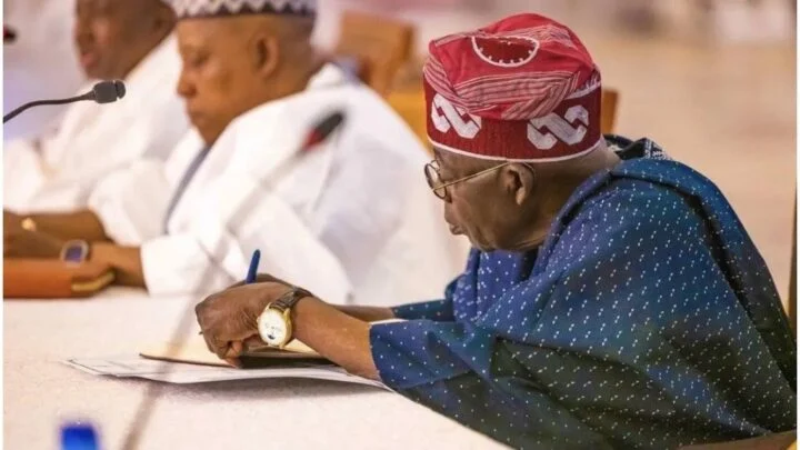 Tinubu signs e1704969943206