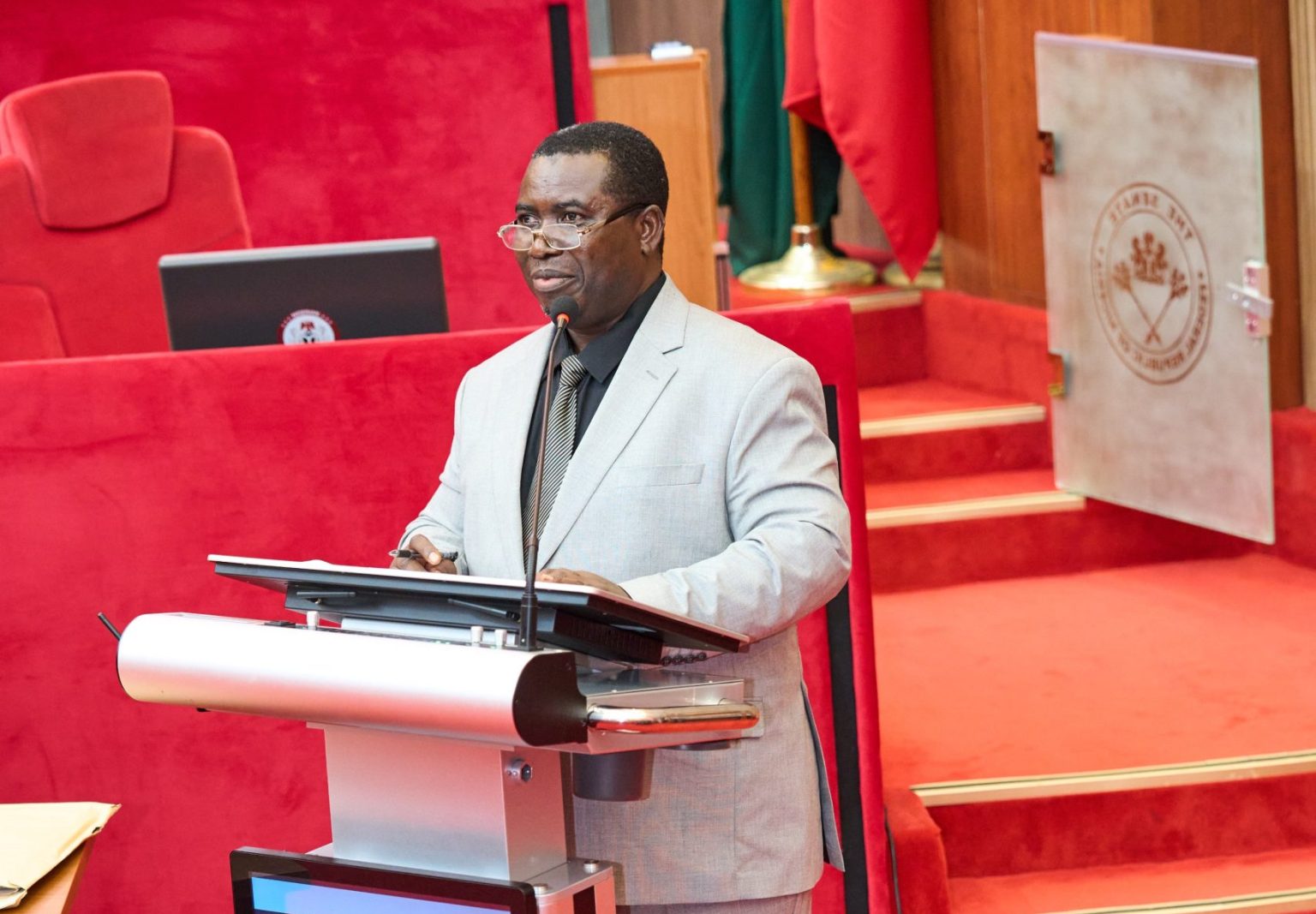 Joash Amupitan speaking scaled e1763469359209 1536x1067 1