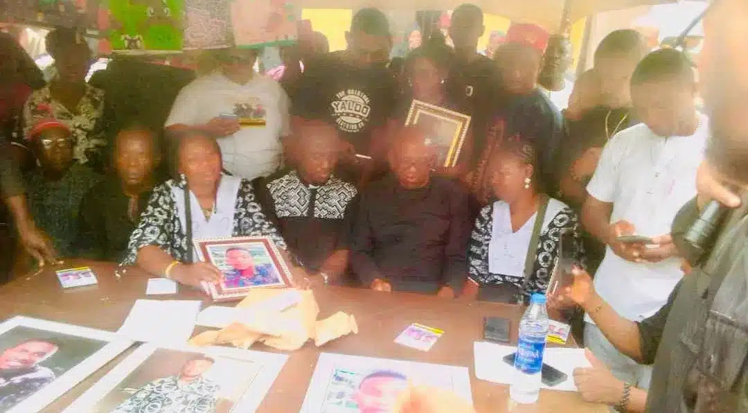 Peter Obi sitting with the bereaved family e1768477907803