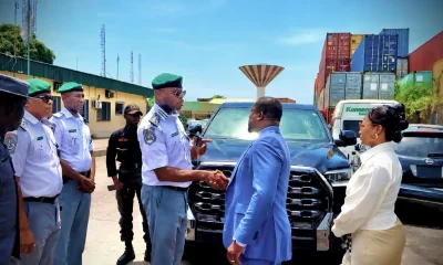 Customs officials during the handing over. 1536x856.jpg